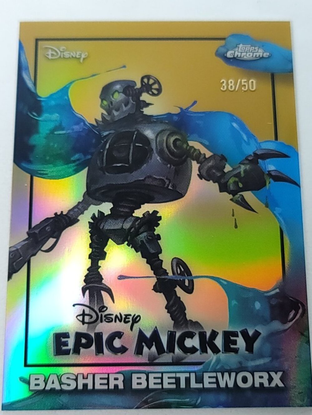 Captain Basher Beetleworx Topps 2026 Disney Neon Gold Epic Mickey Chrome 10/50